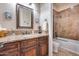 Elegant bathroom with granite countertop and tiled shower at 28370 N 113Th Way, Scottsdale, AZ 85262