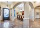 Elegant formal dining room with a chandelier and hardwood table at 28370 N 113Th Way, Scottsdale, AZ 85262