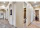 Elegant hallway with tile floors and access to other rooms at 28370 N 113Th Way, Scottsdale, AZ 85262