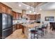 Gourmet kitchen with granite island, stainless steel appliances, and custom cabinetry at 28370 N 113Th Way, Scottsdale, AZ 85262