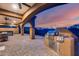 Outdoor patio area with built-in grill and sunset view at 28370 N 113Th Way, Scottsdale, AZ 85262