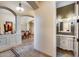 Convenient powder room with an ornate vanity and elegant fixtures at 28370 N 113Th Way, Scottsdale, AZ 85262