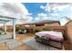 Covered patio with hot tub, perfect for relaxing and entertaining at 2963 E Birdsong Ave, San Tan Valley, AZ 85143