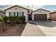 One-story home with two-car garage and landscaped front yard at 2963 E Birdsong Ave, San Tan Valley, AZ 85143