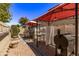 Outdoor kitchen with built-in grill and ample counter space at 302 S Laguna Dr, Gilbert, AZ 85233