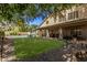 Landscaped backyard featuring a large grassy area and a pool at 302 S Laguna Dr, Gilbert, AZ 85233