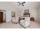 Main bedroom with sitting area and large windows at 302 S Laguna Dr, Gilbert, AZ 85233