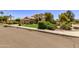 House exterior showcasing landscaping and street view at 302 S Laguna Dr, Gilbert, AZ 85233