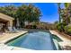 Refreshing pool with ample patio space for relaxation at 302 S Laguna Dr, Gilbert, AZ 85233