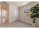 Bedroom with carpet flooring, large closet, and window at 3238 W Garnet St, San Tan Valley, AZ 85144