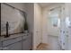 Bright hallway with grey cabinet and view into another room at 3238 W Garnet St, San Tan Valley, AZ 85144