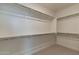 Large walk-in closet with ample shelving and hanging space at 3238 W Garnet St, San Tan Valley, AZ 85144