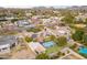 Aerial view showing house, pool, and neighborhood at 331 E Tuckey Ln, Phoenix, AZ 85012