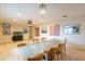 Spacious dining area with a large table, chandelier, and hardwood floors at 331 E Tuckey Ln, Phoenix, AZ 85012