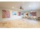 Open dining area with tile floors and views into the kitchen at 331 E Tuckey Ln, Phoenix, AZ 85012