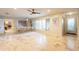 Dining room with hardwood floors and view into the kitchen and living room at 331 E Tuckey Ln, Phoenix, AZ 85012