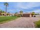 Home with a brick driveway and a neatly landscaped front yard at 331 E Tuckey Ln, Phoenix, AZ 85012