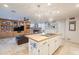 Kitchen island with butcher block countertop and white cabinets at 331 E Tuckey Ln, Phoenix, AZ 85012