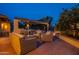 Backyard patio features a pergola, wicker furniture, and a view of the pool at 331 E Tuckey Ln, Phoenix, AZ 85012