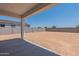 Spacious backyard with block wall and grassy area at 35775 N Zinc Dr, San Tan Valley, AZ 85144