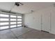 Garage with automatic door and concrete floor at 35775 N Zinc Dr, San Tan Valley, AZ 85144