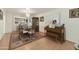 Formal dining room with wood furniture and a patterned rug at 4305 E Earll Dr, Phoenix, AZ 85018