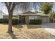 Charming single story home with attached garage and well-manicured lawn at 4305 E Earll Dr, Phoenix, AZ 85018