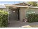 House exterior featuring a covered entryway, well-maintained landscaping, and a classic design at 4305 E Earll Dr, Phoenix, AZ 85018