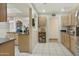 Open kitchen with granite countertops and ample cabinet space at 4305 E Earll Dr, Phoenix, AZ 85018