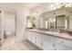 Bathroom with double vanity and tile floor at 4532 E Sandra Ter, Phoenix, AZ 85032