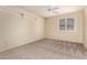 Bright bedroom with ceiling fan and window coverings at 4532 E Sandra Ter, Phoenix, AZ 85032