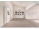 Bright dining room features a chandelier and carpet at 4532 E Sandra Ter, Phoenix, AZ 85032