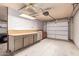 Garage workshop featuring built-in cabinets and workbench at 4532 E Sandra Ter, Phoenix, AZ 85032