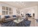 Bright living room with stylish furniture and view to dining area at 4532 E Sandra Ter, Phoenix, AZ 85032