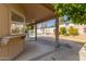 Covered patio overlooking the pool and backyard at 4532 E Sandra Ter, Phoenix, AZ 85032