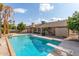 Sparkling blue pool with diving board in the backyard at 4532 E Sandra Ter, Phoenix, AZ 85032