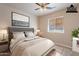 Virtually staged bedroom with a queen-size bed and stylish decor at 470 E Echo Ln, Florence, AZ 85132