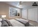 Virtually staged main bedroom with bay window and ample closet space at 470 E Echo Ln, Florence, AZ 85132