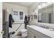 Bathroom with modern fixtures, shower and bath combination, and decorative lighting at 4762 E Pawnee Cir, Phoenix, AZ 85044