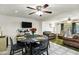 Dining area with table set for four, in open concept living space at 4762 E Pawnee Cir, Phoenix, AZ 85044