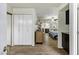 Hallway leading into the bedroom with plenty of closet space for organized storage at 4762 E Pawnee Cir, Phoenix, AZ 85044