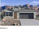 Two-story home with a two-car garage and mountain views at 4929 S 105Th Ln, Tolleson, AZ 85353