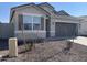 New construction home with a two-car garage at 4929 S 105Th Ln, Tolleson, AZ 85353