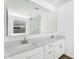 Bathroom with dual vanities, quartz countertops and sleek fixtures at 5030 W Hunter Trl, San Tan Valley, AZ 85144