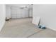 Large garage with white walls and concrete floor at 5030 W Hunter Trl, San Tan Valley, AZ 85144