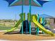 The community playground has multiple slides and climbing areas at 5030 W Hunter Trl, San Tan Valley, AZ 85144