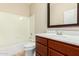 Clean bathroom with a bathtub, toilet and vanity at 5219 W Buckskin Dr, Eloy, AZ 85131