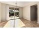 Bright dining room with sliding glass doors to the backyard at 5219 W Buckskin Dr, Eloy, AZ 85131