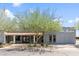 Community clubhouse with covered entry and landscaping at 535 S Alma School Rd # 113, Mesa, AZ 85210