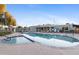 Community pool with spa and lounge chairs at 535 S Alma School Rd # 113, Mesa, AZ 85210